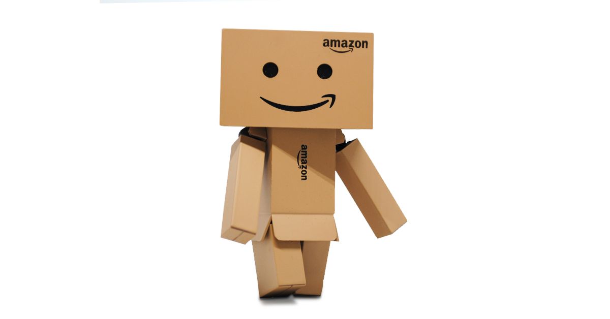 Cardboard character with Amazon branding